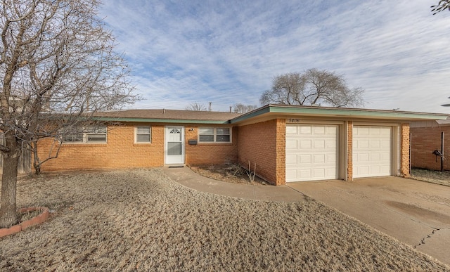 single story home with a garage