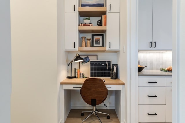 office area featuring built in desk