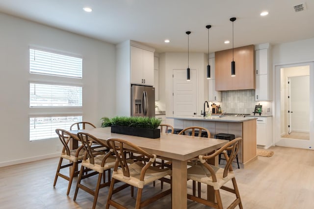 dining area featuring light hardwood / wood-style floors