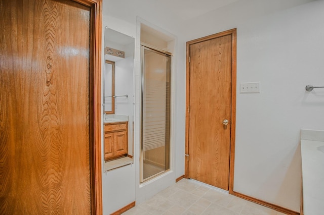 bathroom with vanity and walk in shower