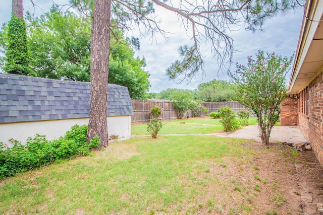 5720 71st St, Lubbock, TX 79424 - fenced backyard with a patio area