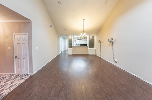 interior space featuring an inviting chandelier, visible vents, baseboards, and dark wood-style flooring