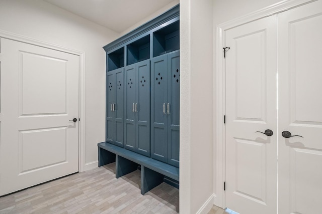 mudroom with light wood-type flooring