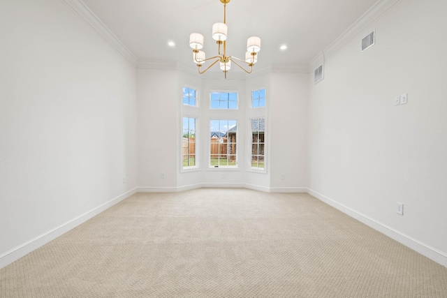 empty room featuring an inviting chandelier, crown molding, and light carpet