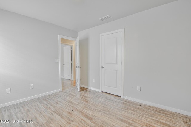 2012 Kenwood Ave, Lubbock, TX 79407 - empty room featuring light wood finished floors and baseboards