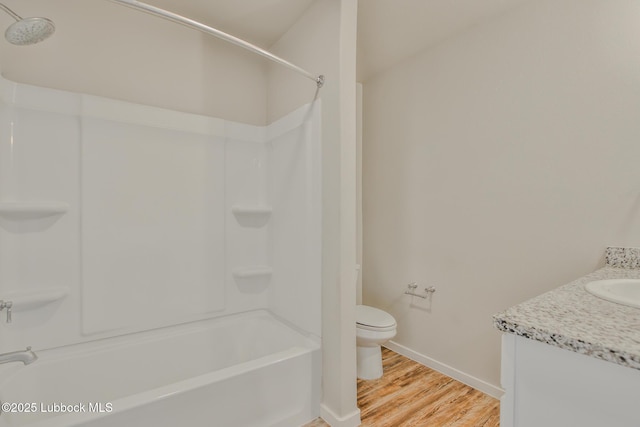2012 Kenwood Ave, Lubbock, TX 79407 - bathroom with wood finished floors, shower / tub combination, and vanity