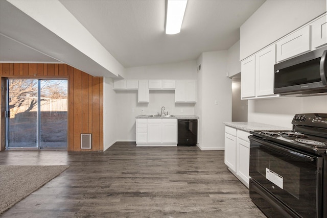 kitchen featuring white cabinetry, dark hardwood / wood-style floors, sink, and black appliances