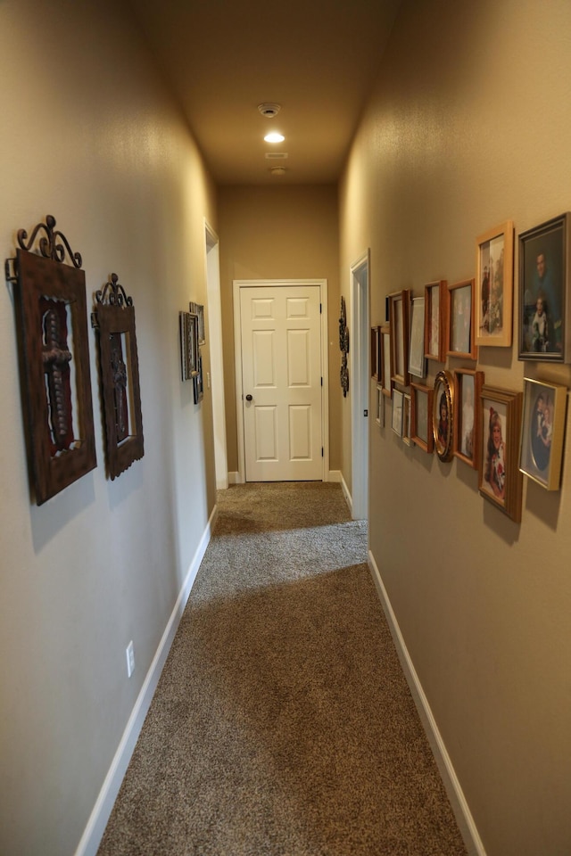 1414 Cactus Dr, Levelland, TX 79336 - corridor with baseboards and carpet