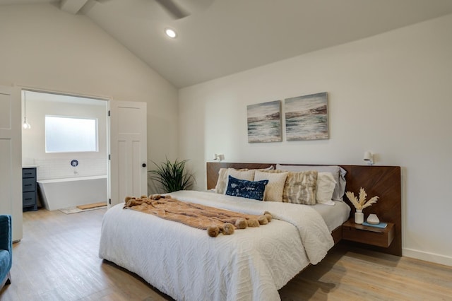 bedroom featuring beamed ceiling, high vaulted ceiling, and light wood-type flooring