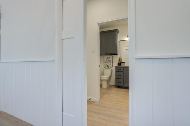 corridor with light wood-type flooring