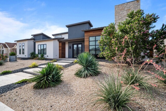 4803 120th St, Lubbock, TX 79424 - contemporary house with stucco siding and french doors