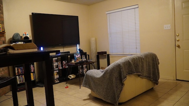 living area featuring light tile patterned flooring