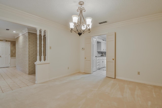 empty room featuring ornamental molding, light carpet, and a textured ceiling