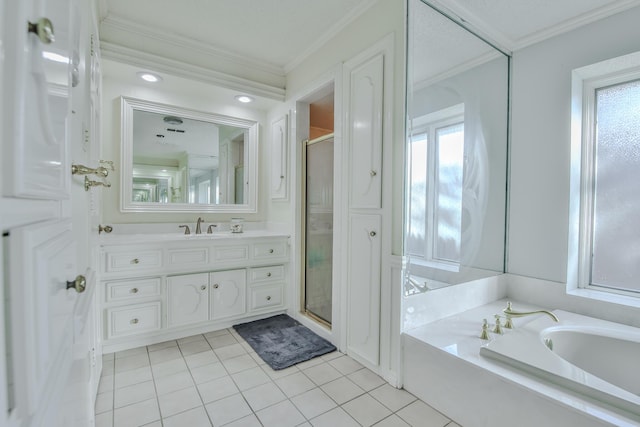 bathroom featuring plenty of natural light, vanity, ornamental molding, plus walk in shower, and tile patterned floors