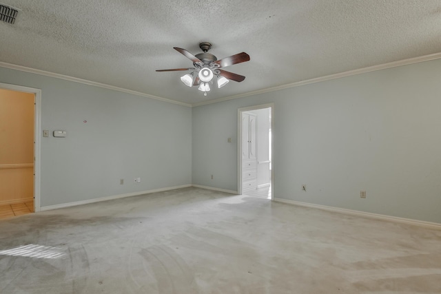 spare room with light carpet, ceiling fan, ornamental molding, and a textured ceiling