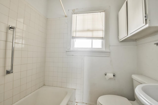 bathroom featuring sink and toilet