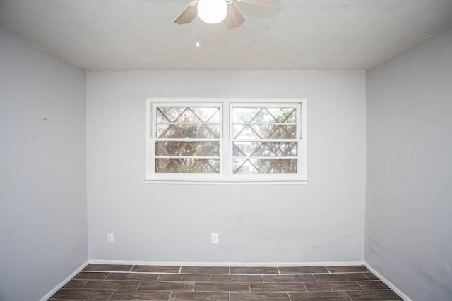 spare room with ceiling fan