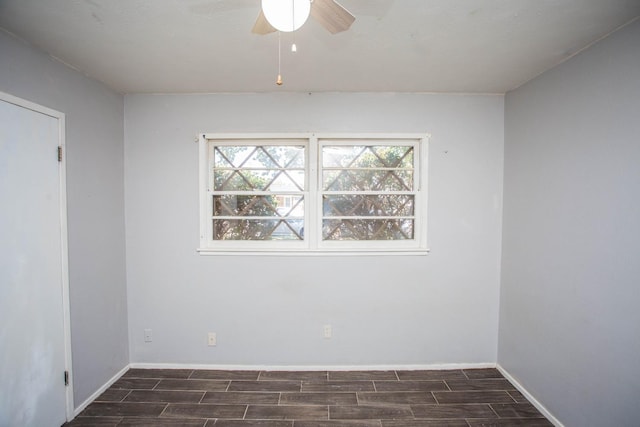 spare room with ceiling fan