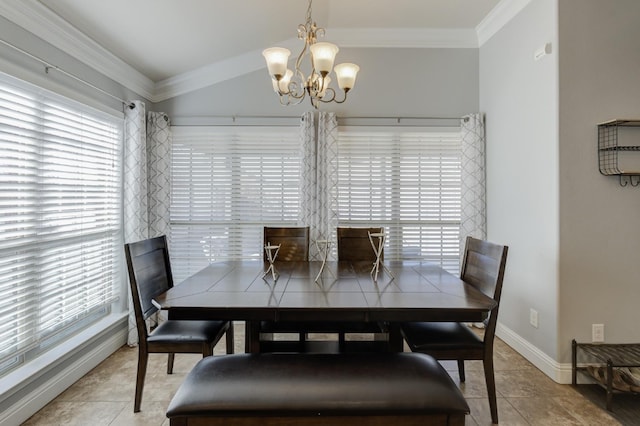 dining room with crown molding, a wealth of natural light, and light tile patterned floors