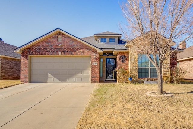 view of front of property with a garage