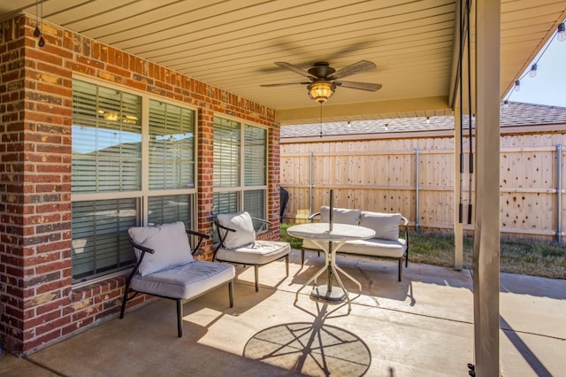 view of patio with ceiling fan