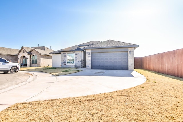 view of front of property featuring a garage