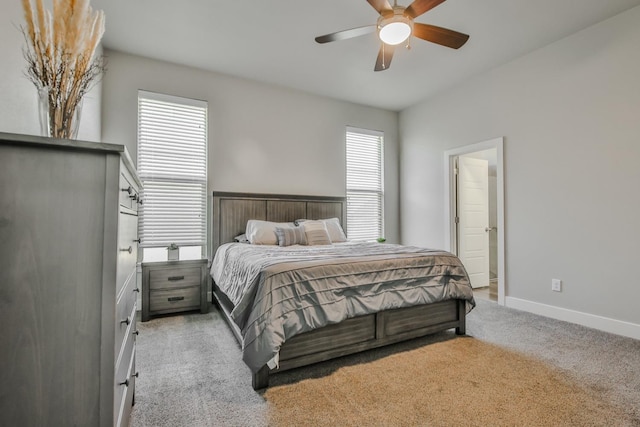 bedroom with light carpet and ceiling fan