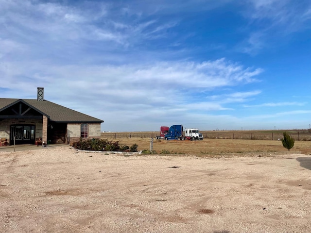 view of yard featuring a rural view