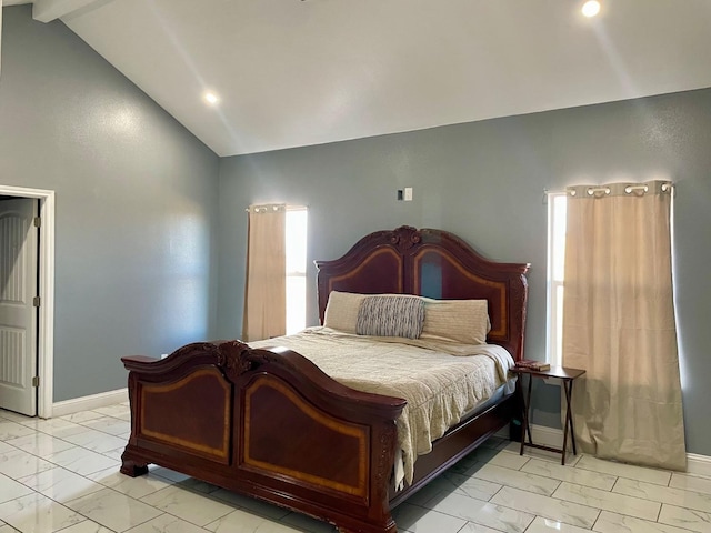 bedroom featuring lofted ceiling