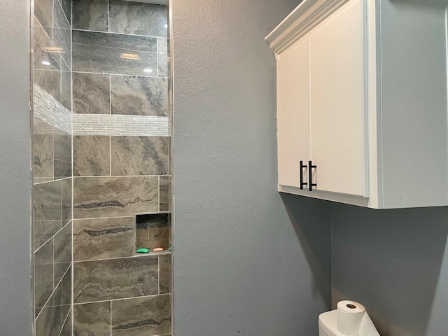 bathroom featuring toilet