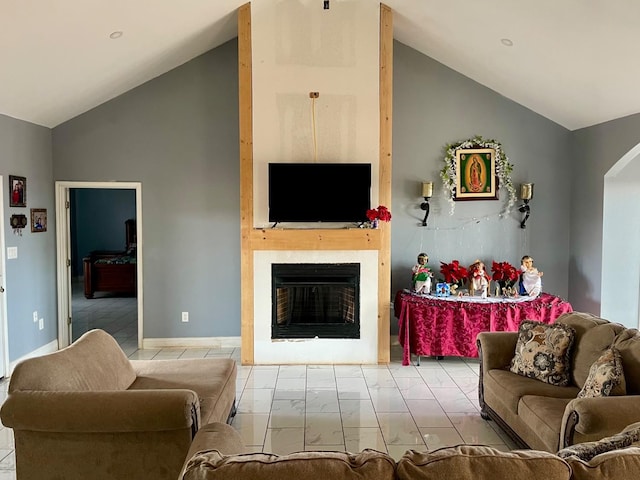 living room featuring vaulted ceiling