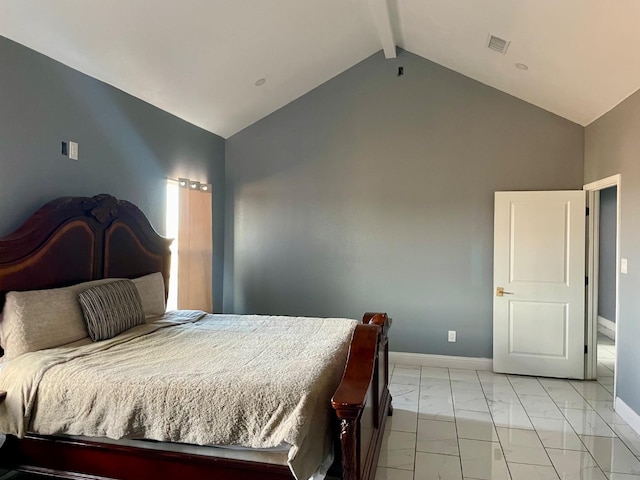 bedroom with vaulted ceiling with beams