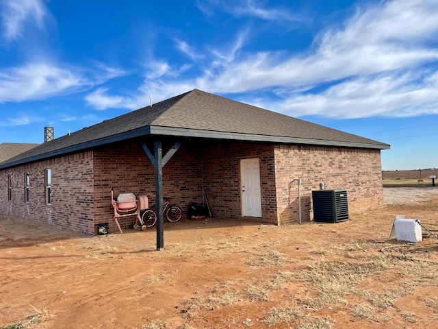 view of property exterior with central air condition unit