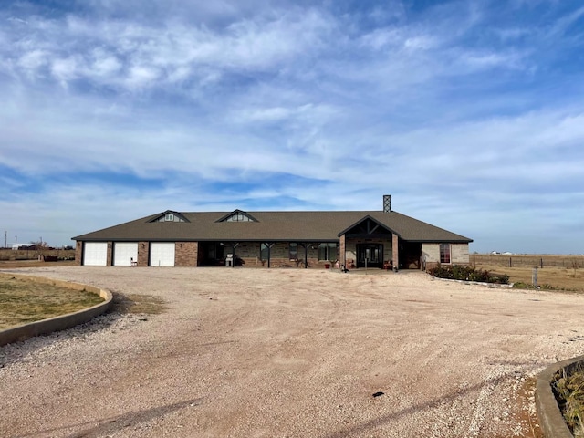 ranch-style house with a garage