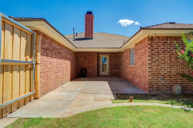 entrance to property featuring a patio area