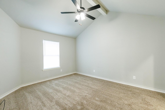 carpeted empty room featuring vaulted ceiling with beams, baseboards, and ceiling fan