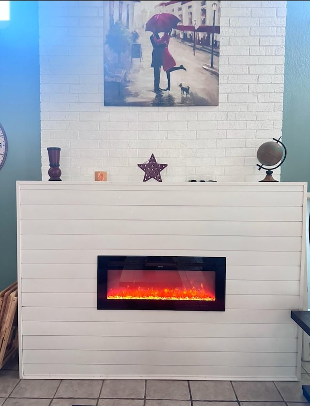 room details featuring a large fireplace