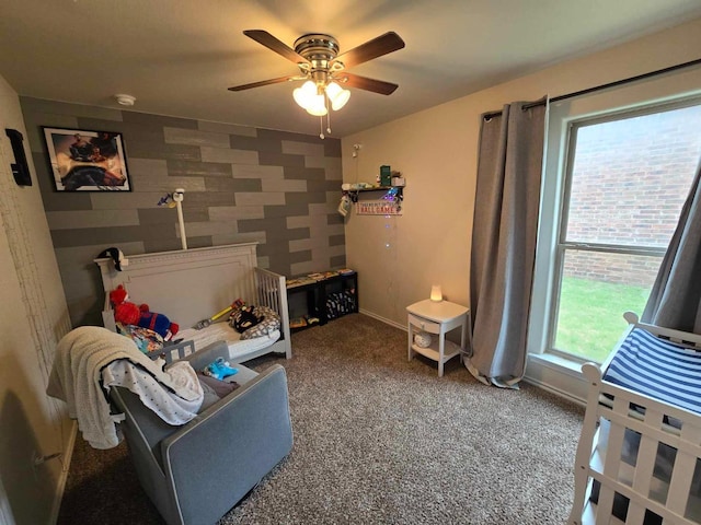 bedroom with ceiling fan and carpet flooring