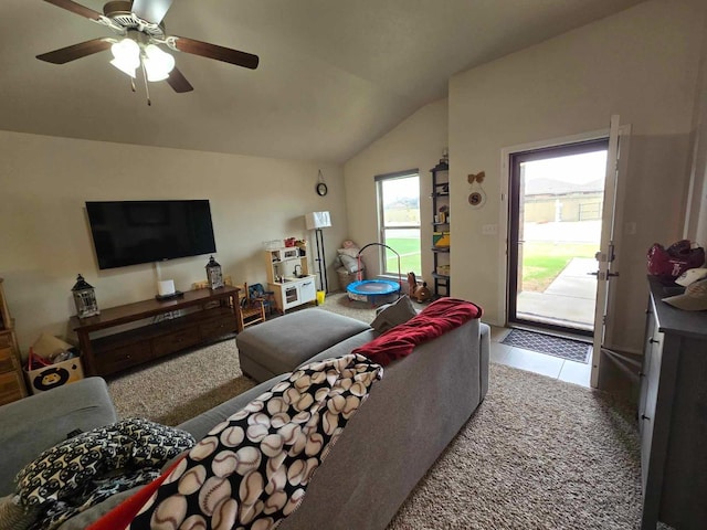 tiled living room with vaulted ceiling and ceiling fan