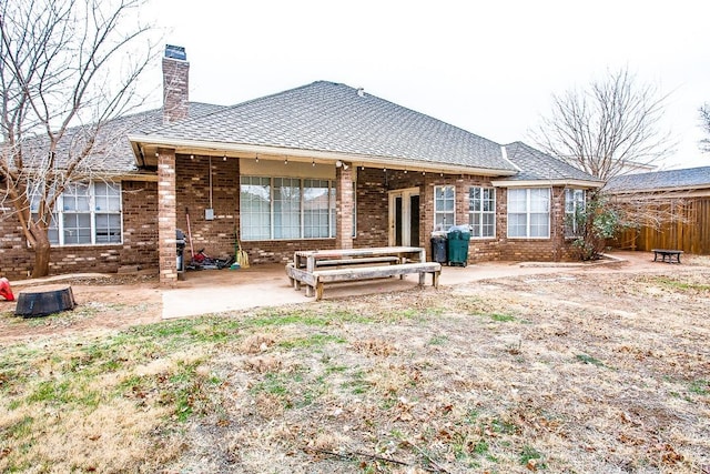 rear view of house featuring a patio