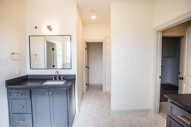1312 Chaucer Ln, Wolfforth, TX 79382 - full bath featuring vanity and marble look tile flooring