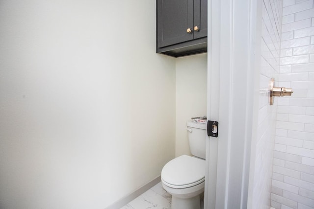1312 Chaucer Ln, Wolfforth, TX 79382 - bathroom with toilet and marble finish floors