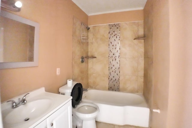 full bathroom featuring vanity, toilet, and tiled shower / bath combo