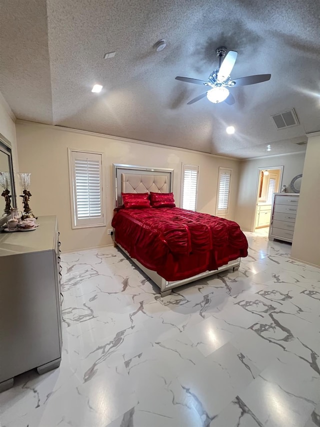 bedroom featuring lofted ceiling, a textured ceiling, and ceiling fan