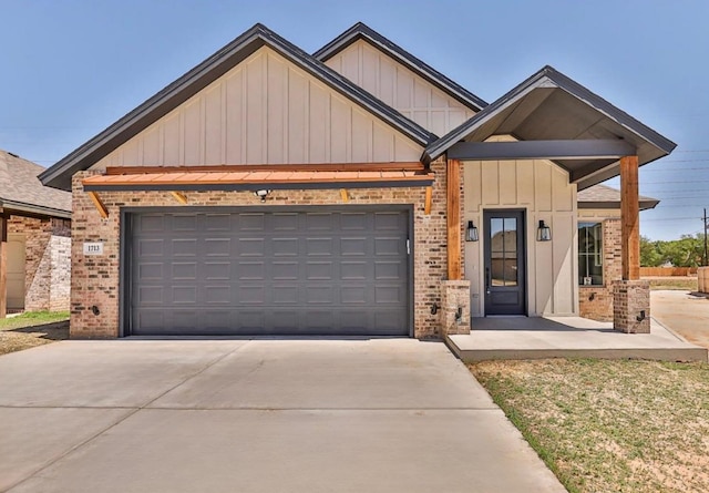 view of front of property with a garage