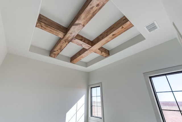 details featuring beamed ceiling, visible vents, and coffered ceiling