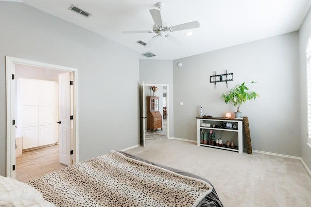 bedroom featuring ceiling fan and light carpet