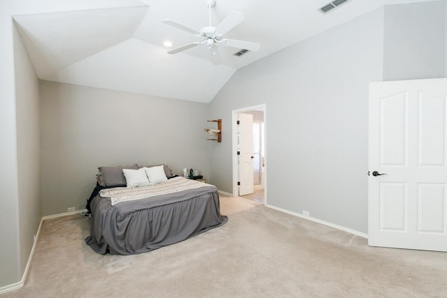 bedroom featuring lofted ceiling, visible vents, light carpet, and baseboards