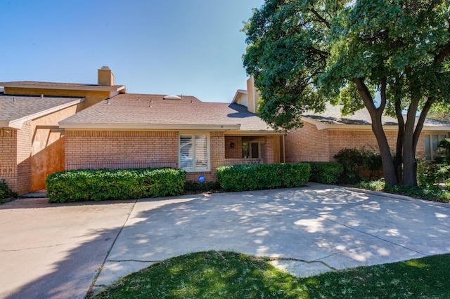 ranch-style house featuring a patio