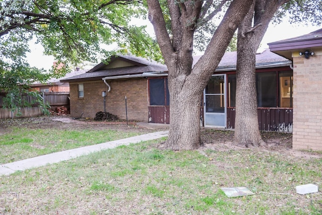 exterior space featuring a lawn